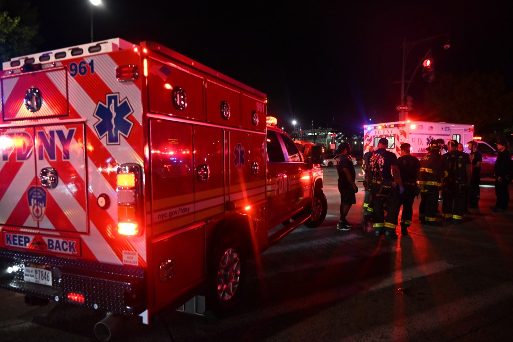 First responders attending to a shooting victim.