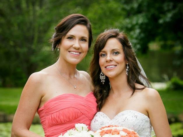 The author and her sister on the author's wedding day.