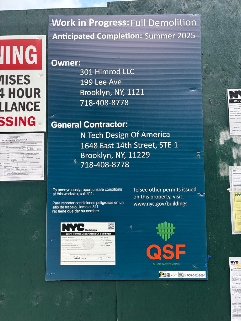 Construction site notice with permit information and contact details.