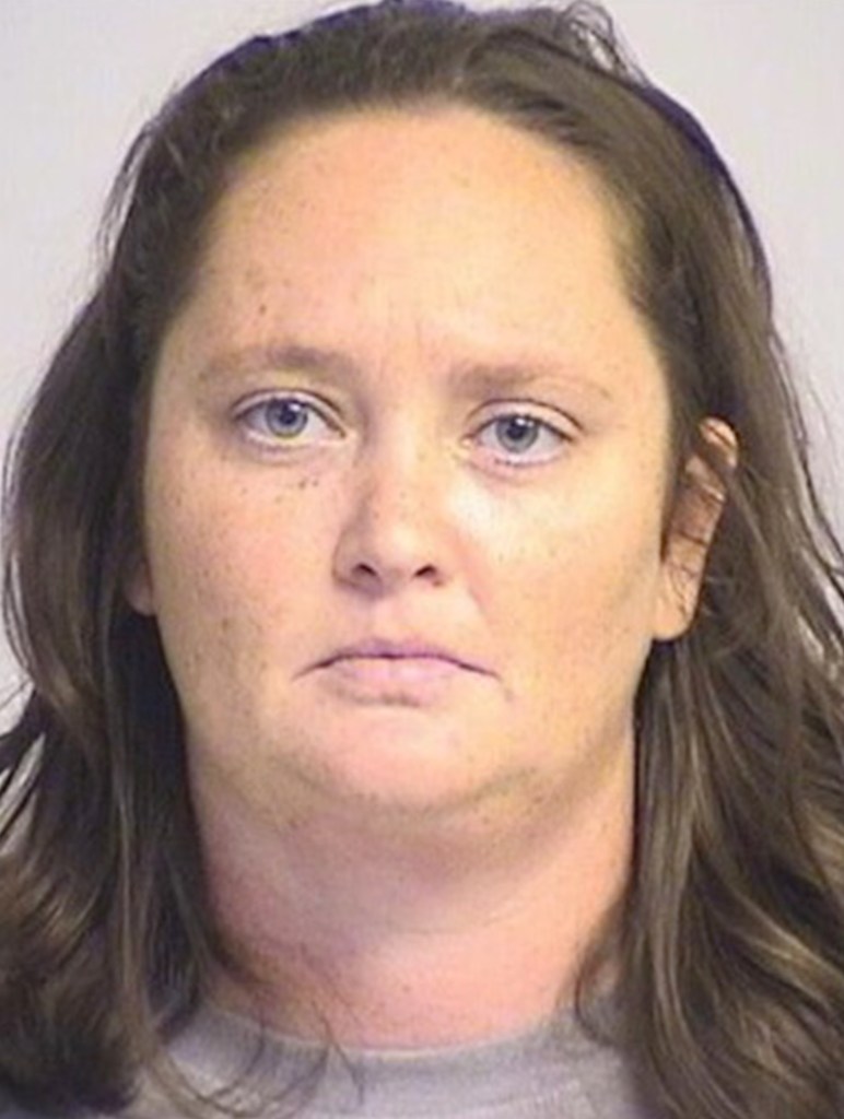 The educator was arrested and charged Friday. 