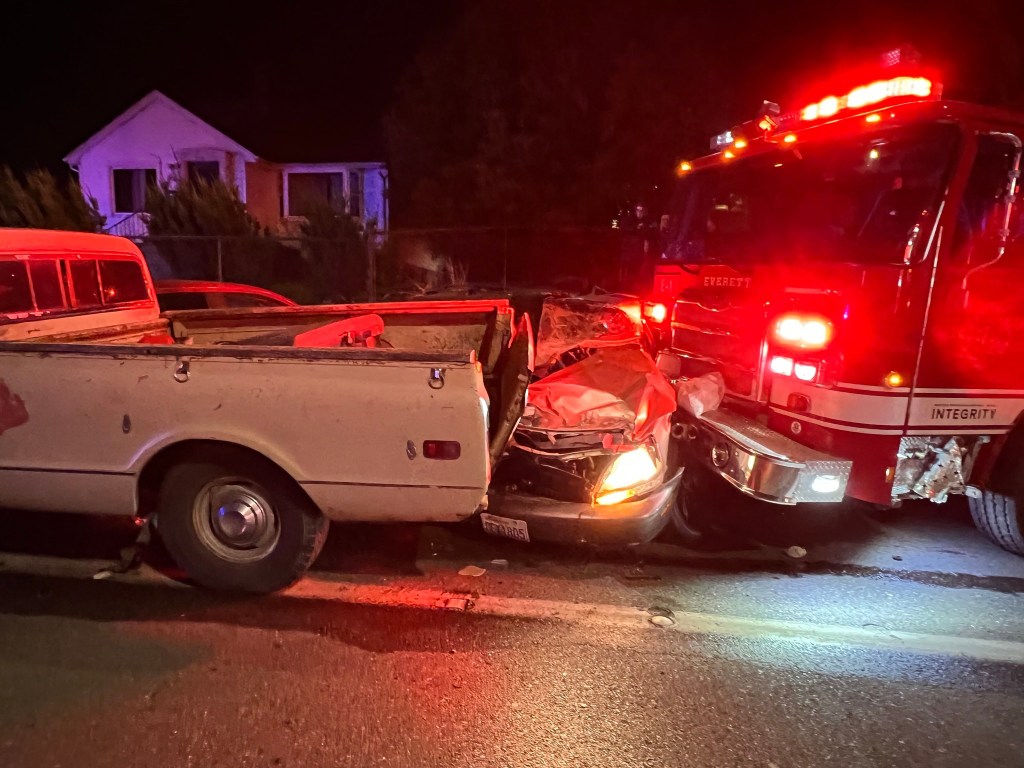 Car accident at night with a firetruck.