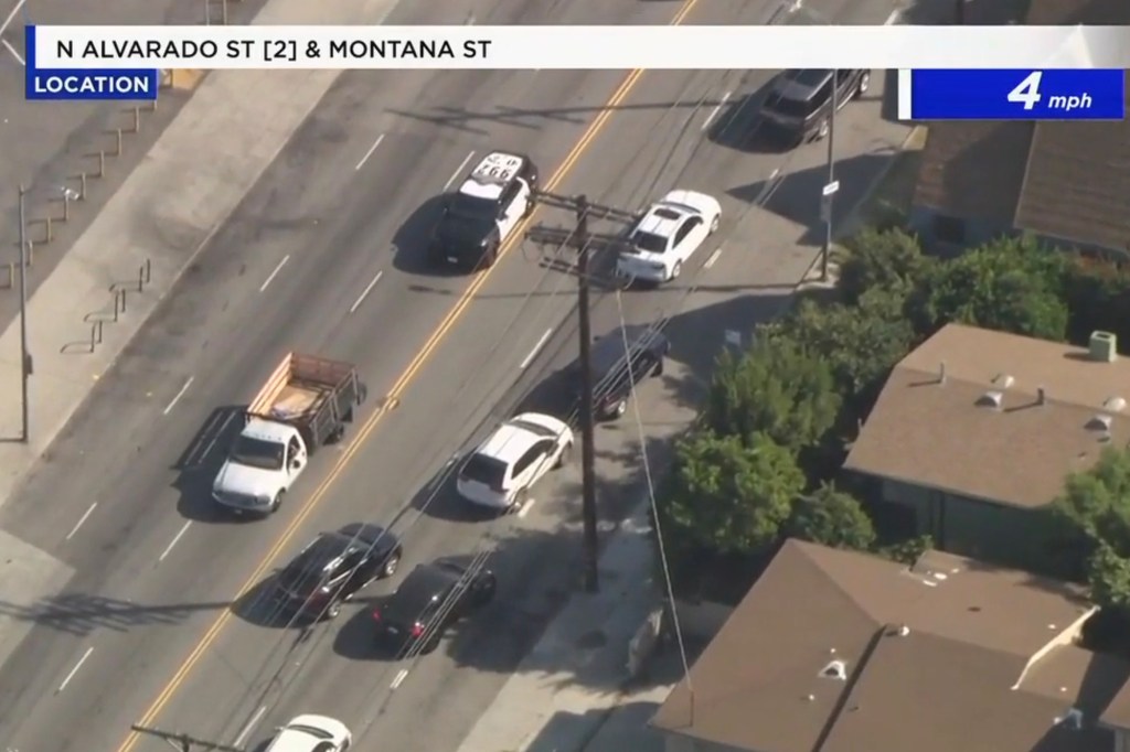 Aerial view of slow-moving traffic on N Alvarado St and Montana St.