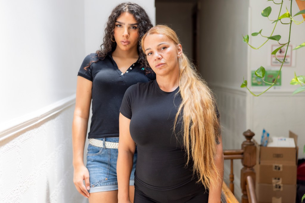 Portrait of a mother and her transgender daughter.