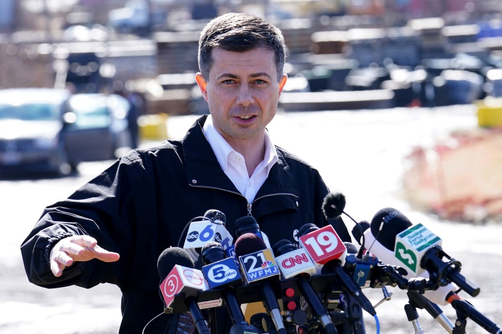 Pete Buttigieg speaking at a press conference.