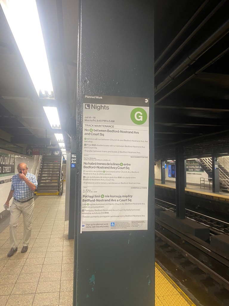 Sign inside G train station describing the suspended service. 