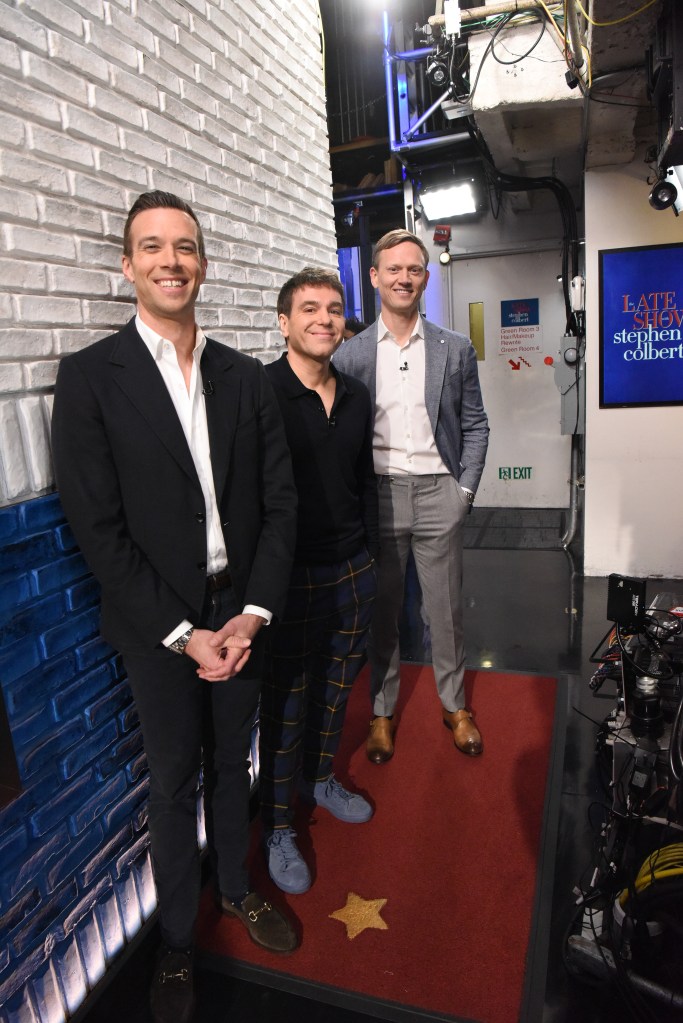 Three men on The Late Show with Stephen Colbert.