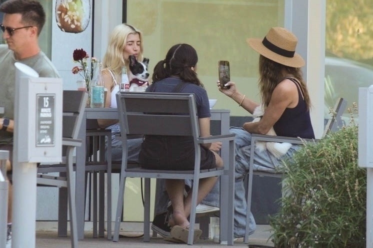 Denise Richards was spotted without her wedding ring after her estranged husband, Aaron Phypers, filed for divorce.