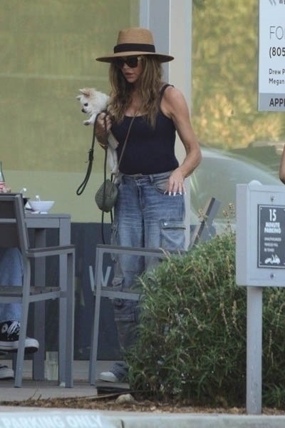 Denise Richards was spotted without her wedding ring after her estranged husband, Aaron Phypers, filed for divorce.