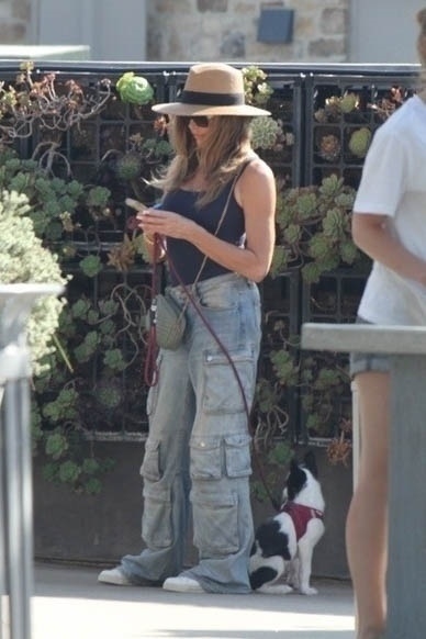 Denise Richards was spotted without her wedding ring after her estranged husband, Aaron Phypers, filed for divorce.
