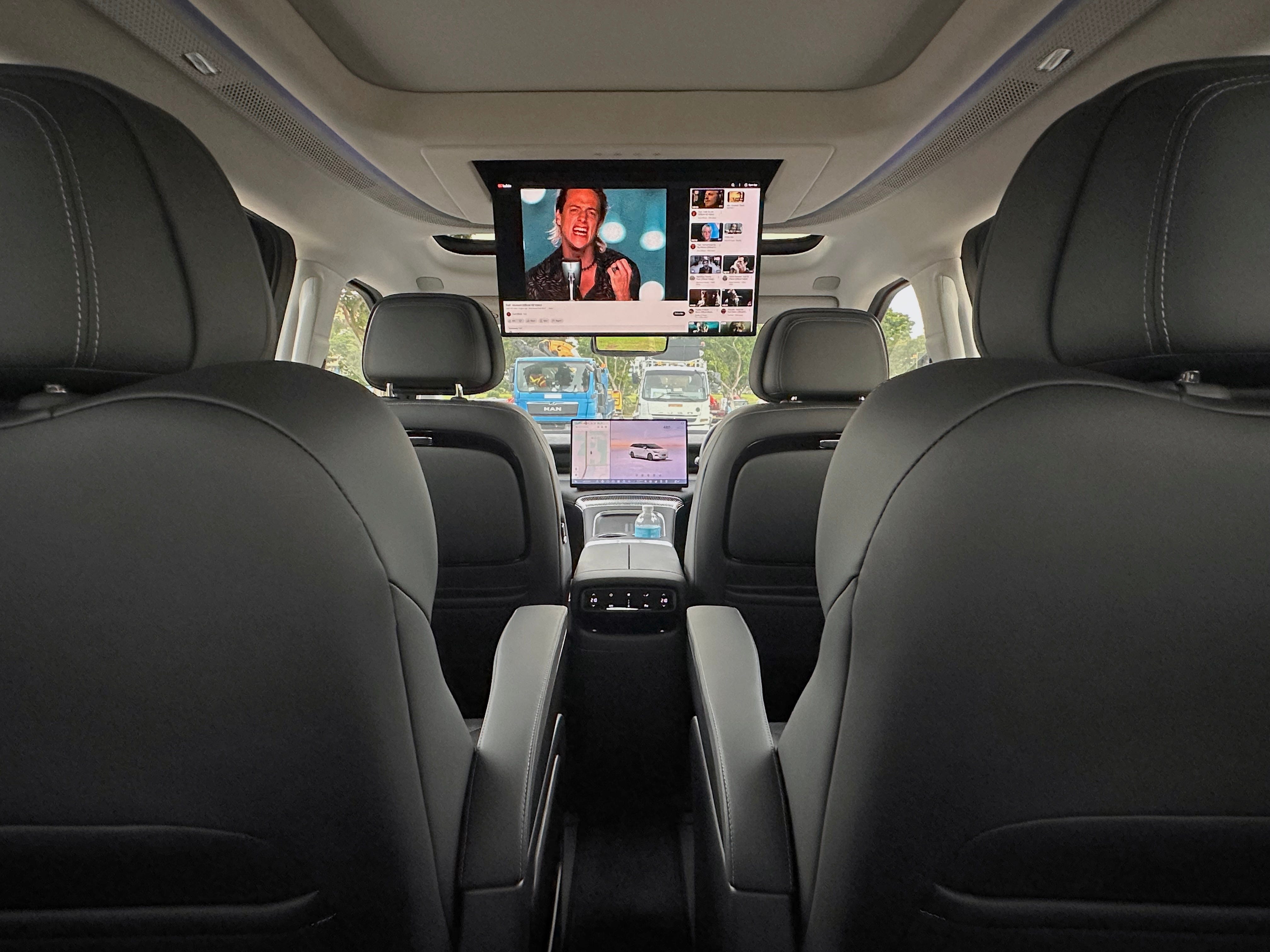 The XPeng X9 has a 21.4-inch entertainment screen for passengers in the back.