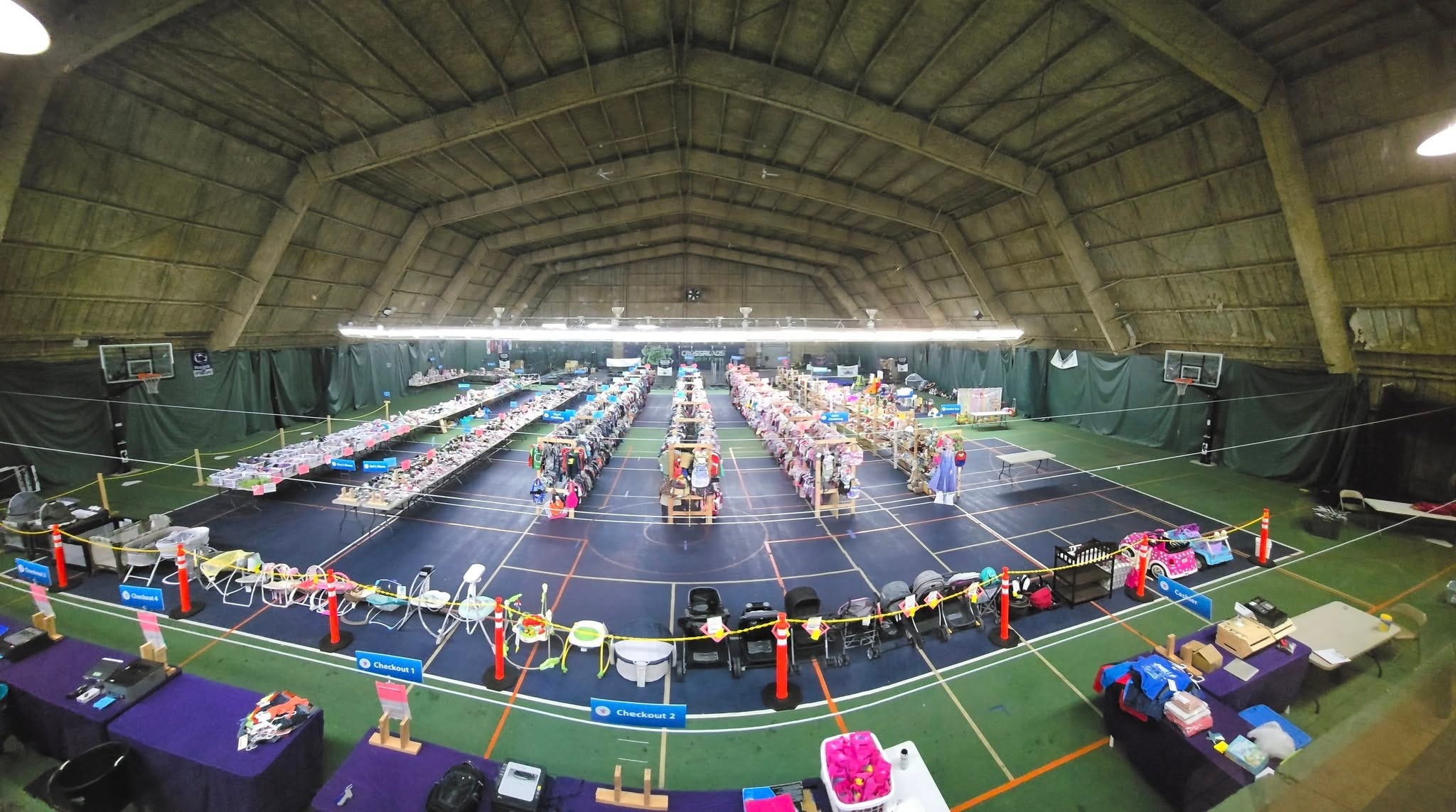 giant warehouse with clothes on wracks