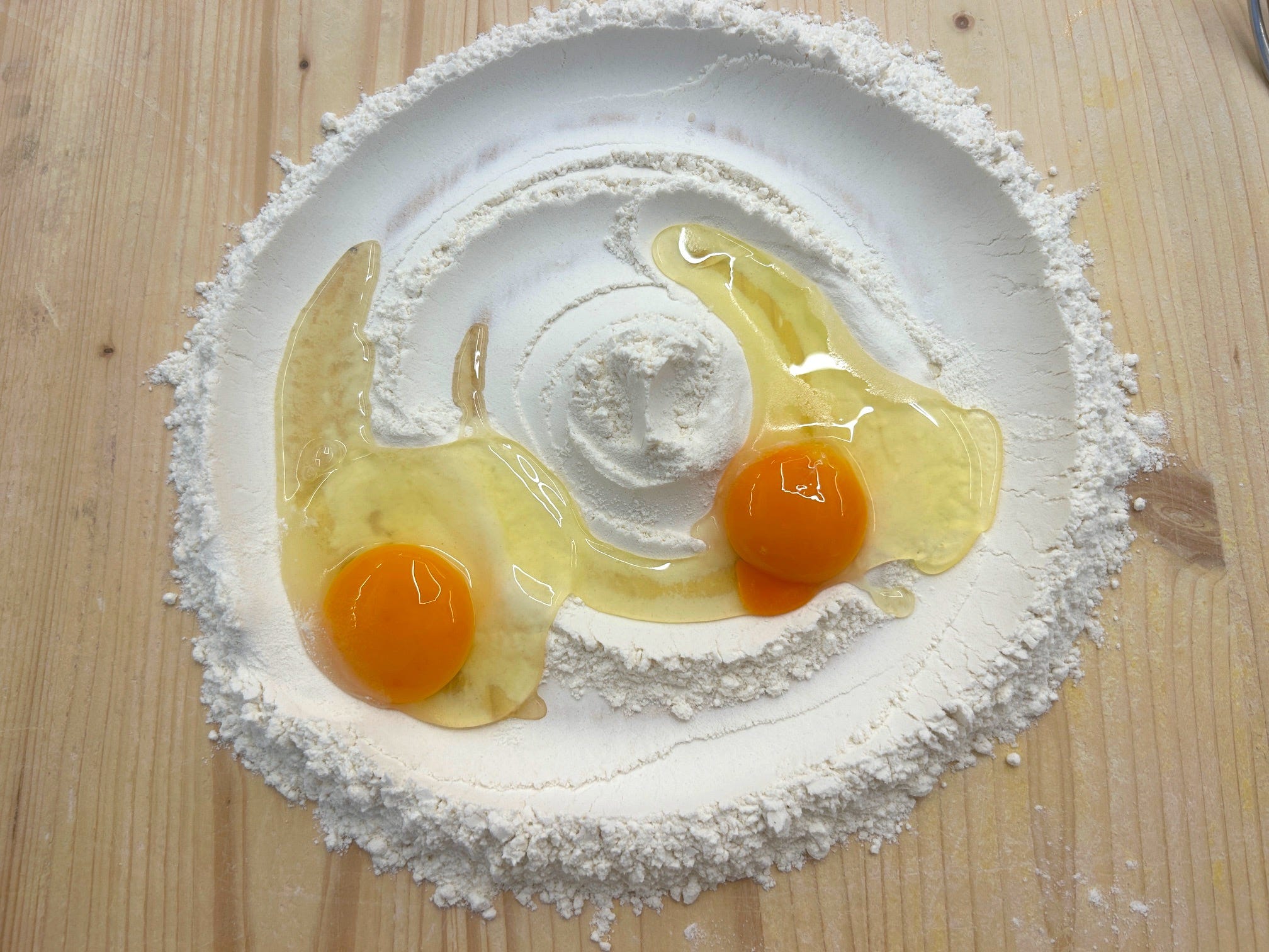 Making homemade pasta at Florence pasta class