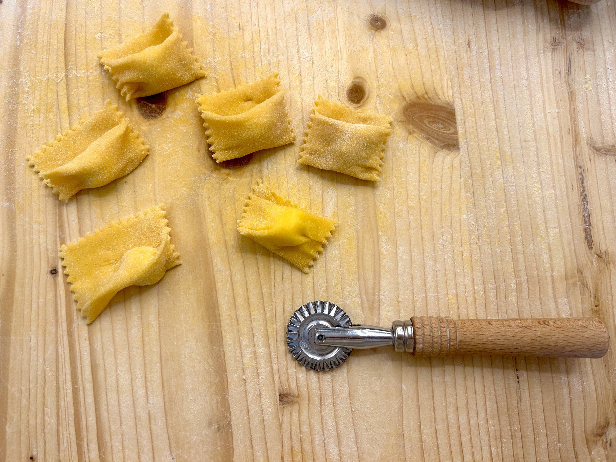 Making homemade pasta at Florence pasta class