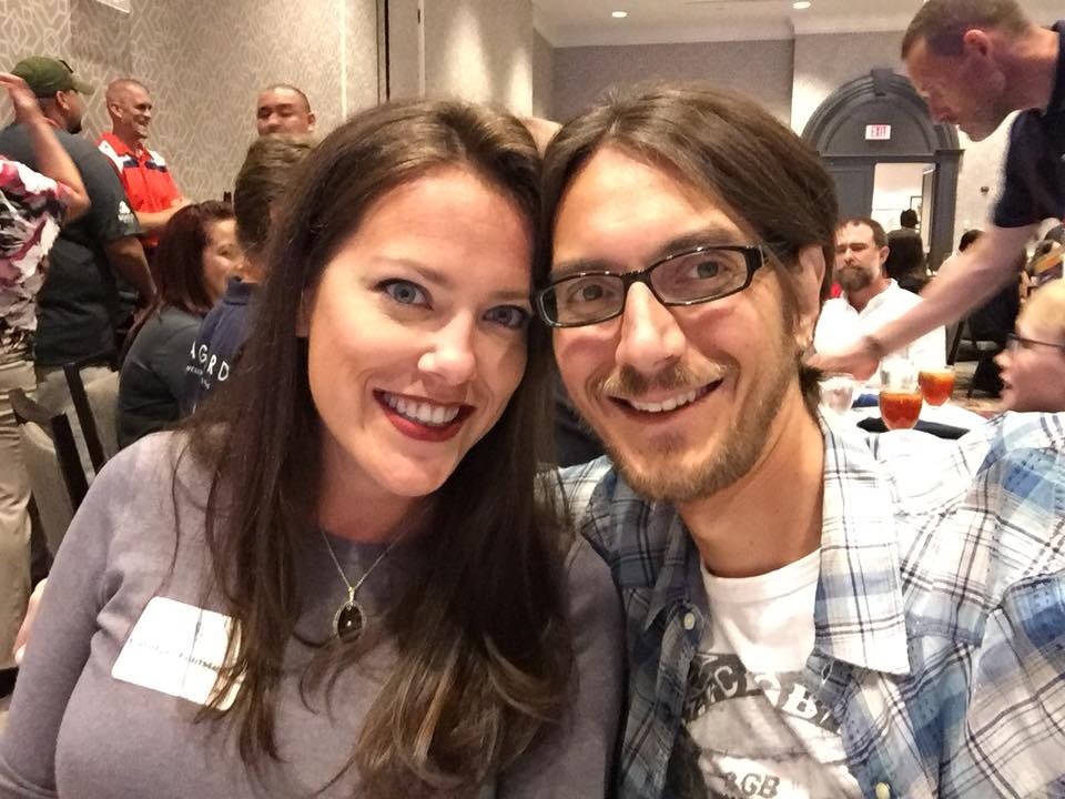 Carolyn Feinstein and Joshua Aaron at a conference.