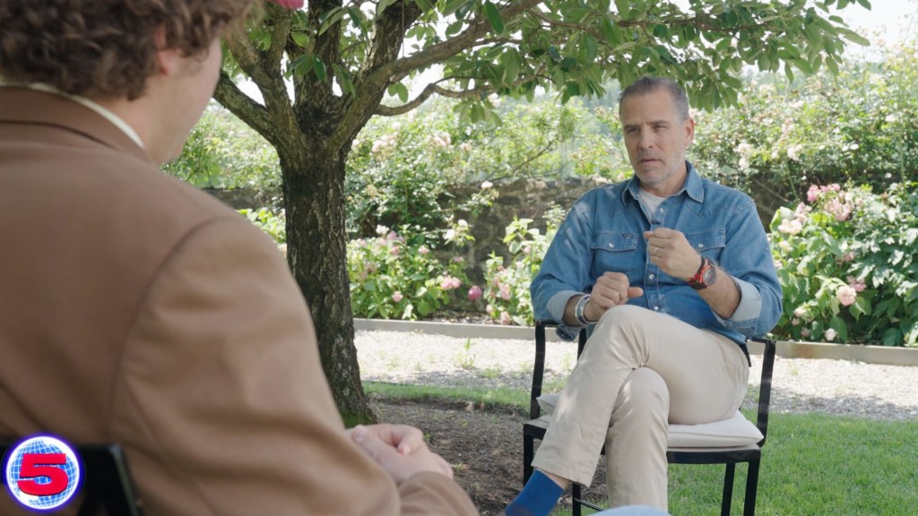 Hunter Biden being interviewed outdoors.