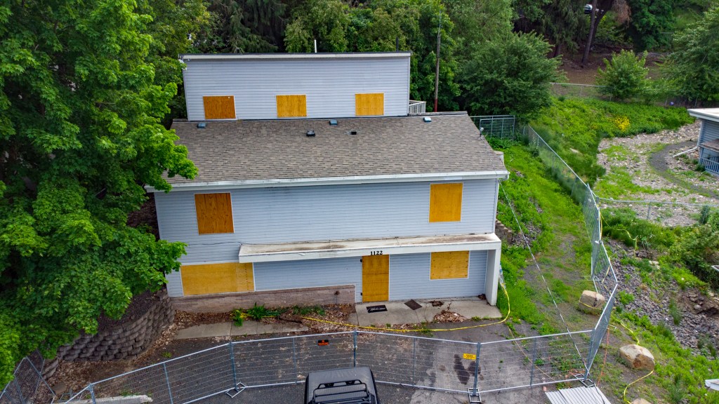 Boarded-up house where four University of Idaho students were murdered.