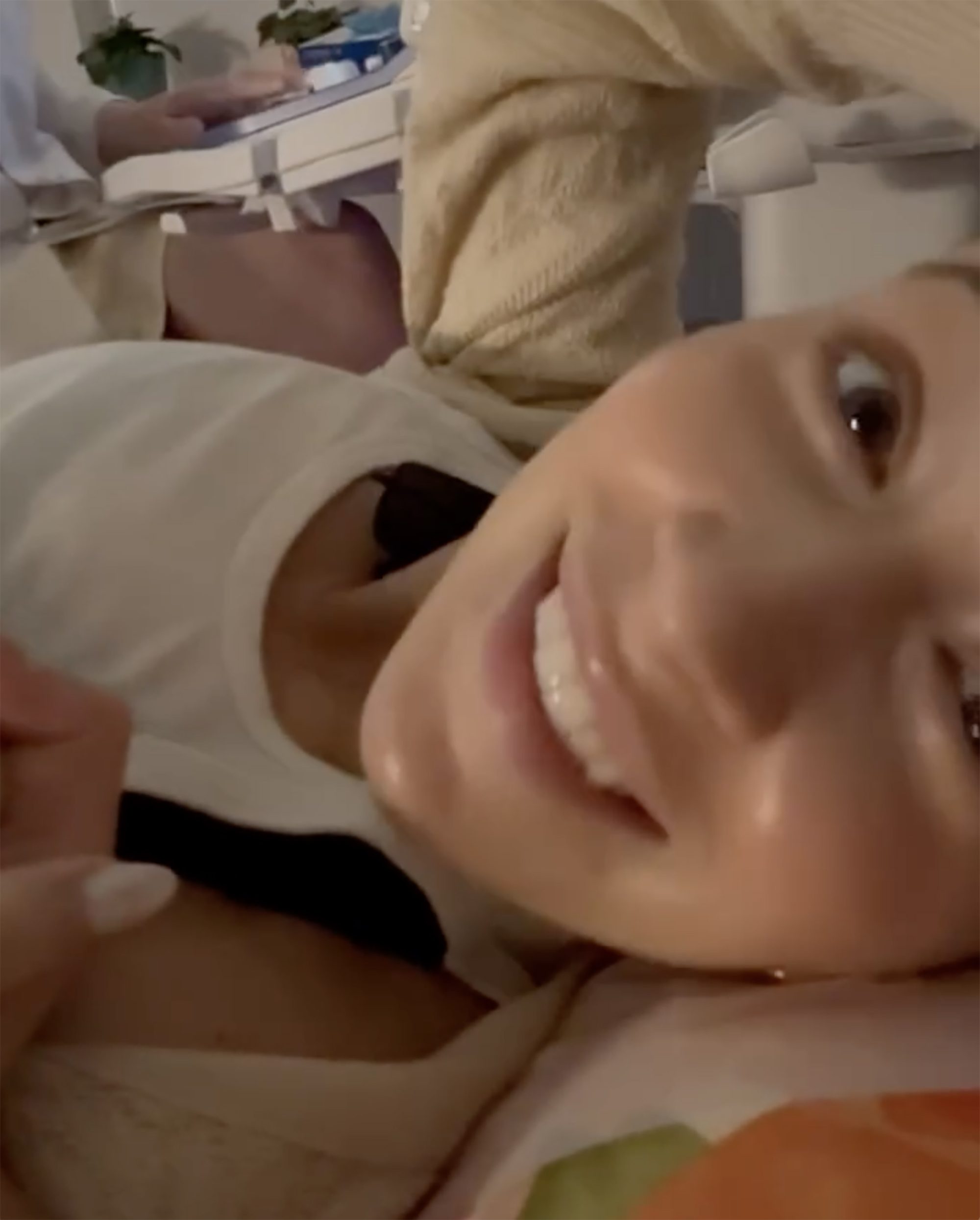 Elsie Hewitt smiles at a camera. 