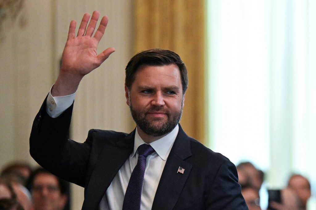 Vice President JD Vance waving at a signing ceremony for the Genius Act.