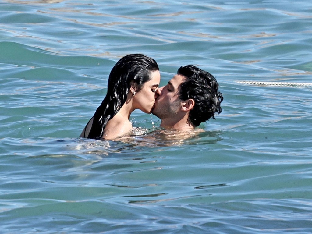 Camila Cabello and her billionaire boyfriend, Henry Junior Chalhoub, were photographed passionately kissing in Spain on Monday.