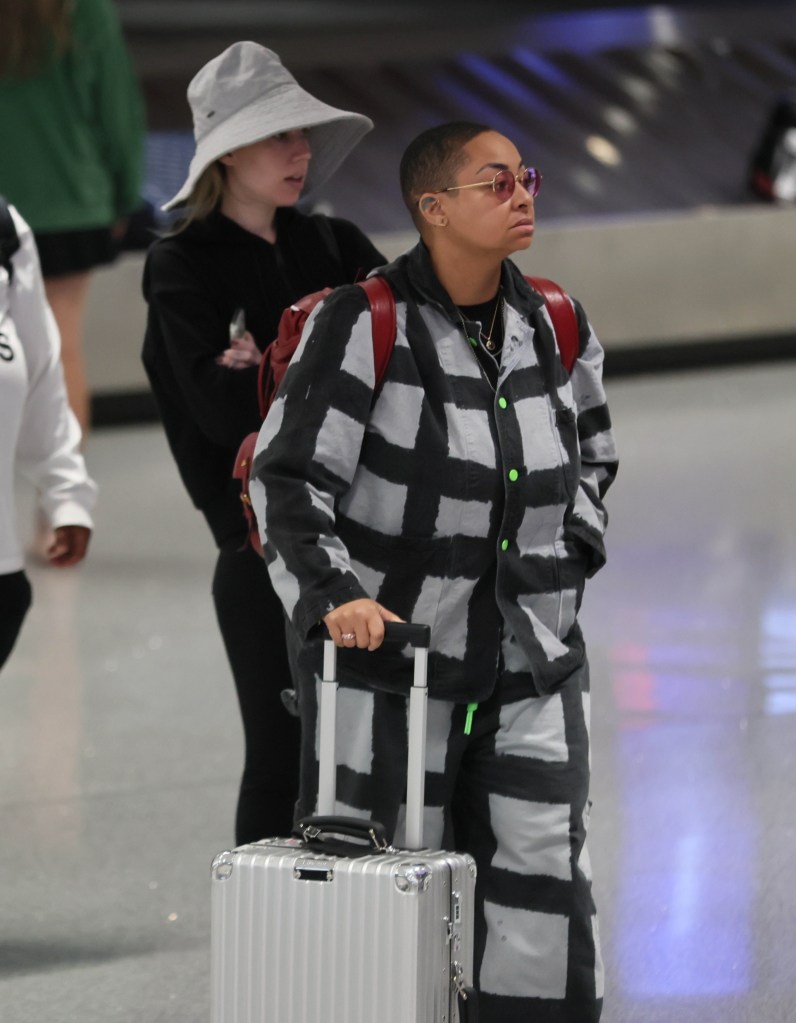 Raven-Symoné and her wife, Miranda Maday, at the airport.