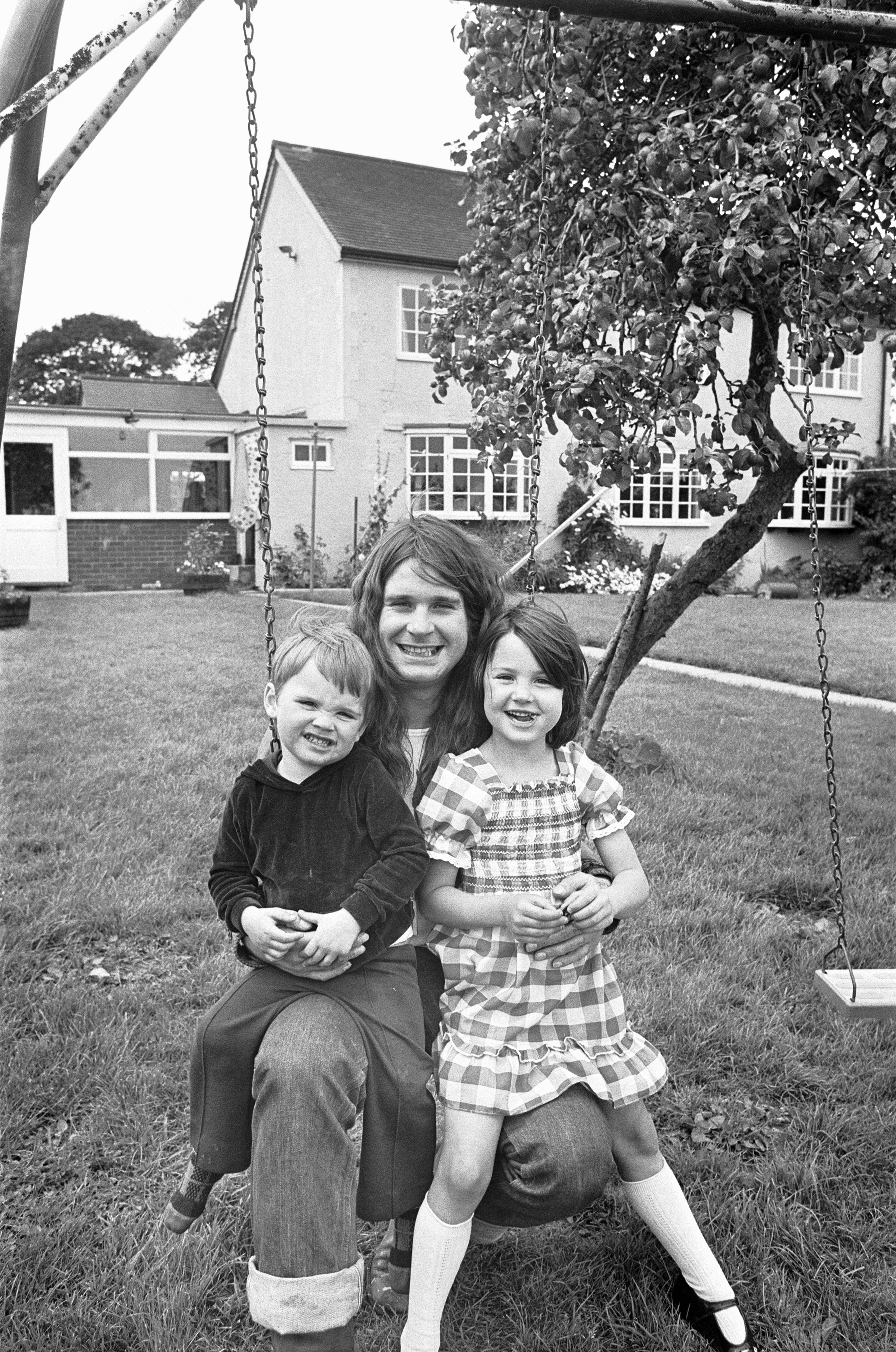 Ozzy Osbourne with his kids Jessica and Louis in 1978