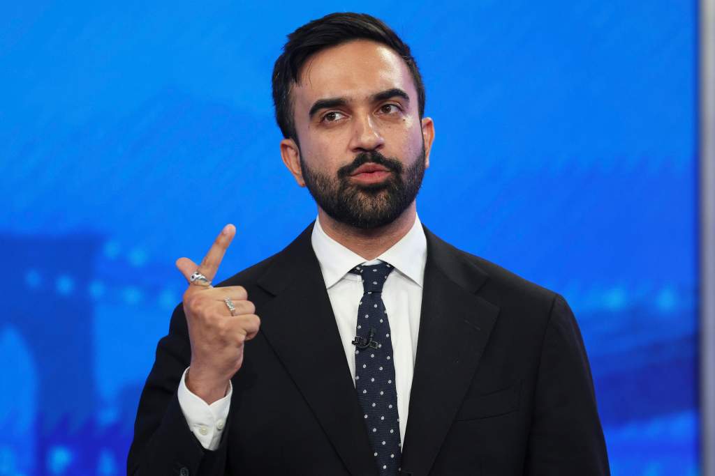 Zohran Mamdani speaking at a NYC mayoral debate.