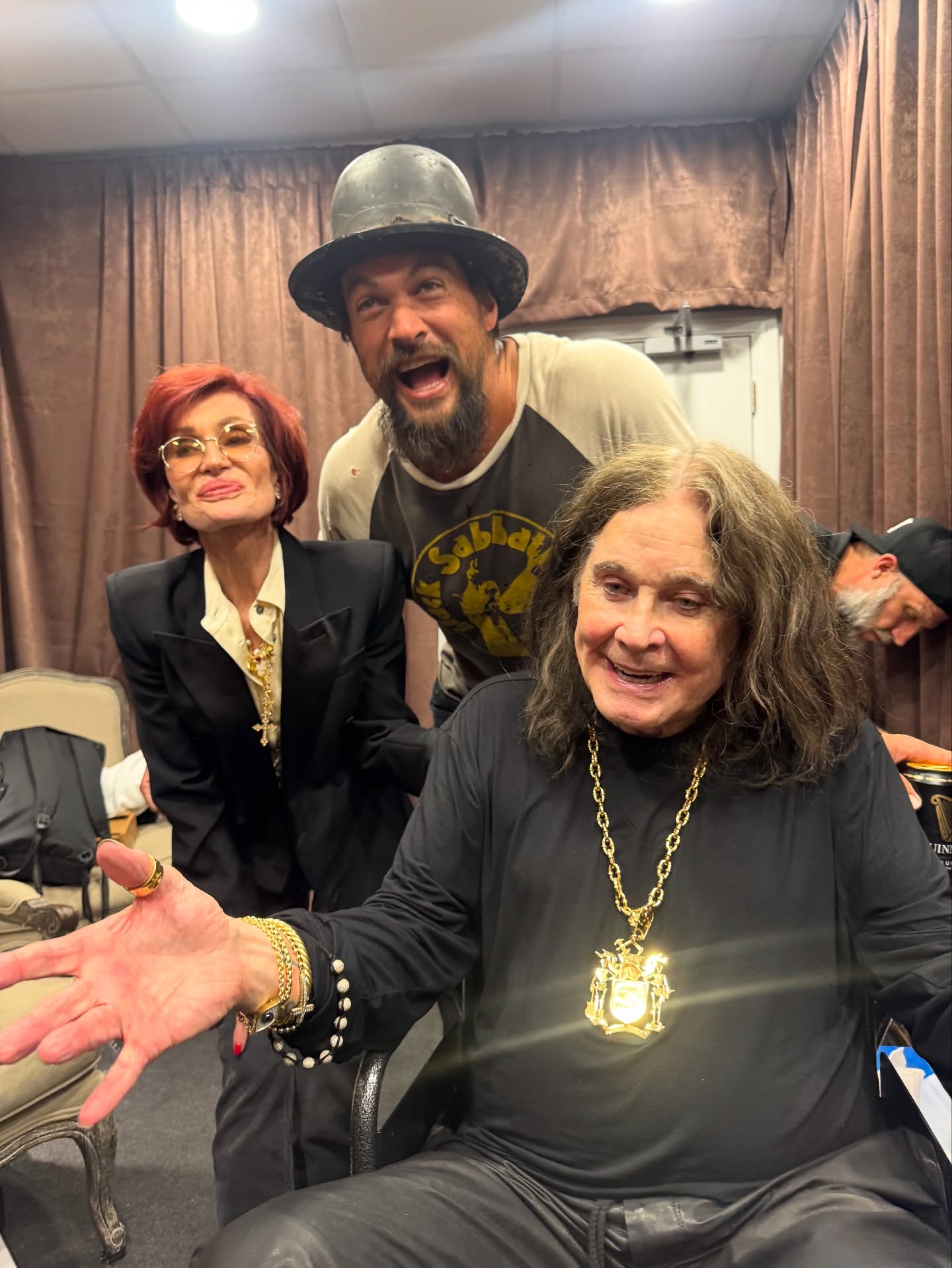Ozzy and Sharon Osbourne with Jason Momoa. 
