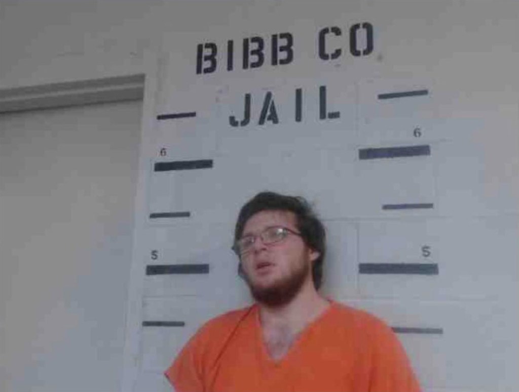 Mugshot of a man in an orange jumpsuit at Bibb Co. Jail.