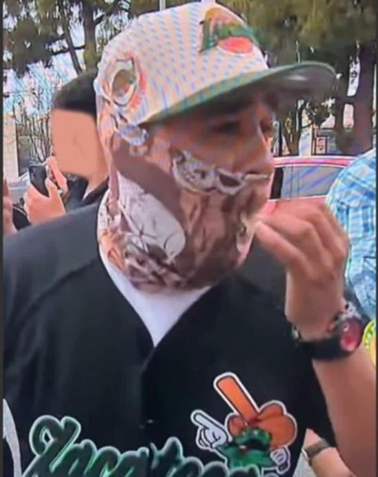 Image of a man wanted for assaulting a federal officer and causing damage to government property.