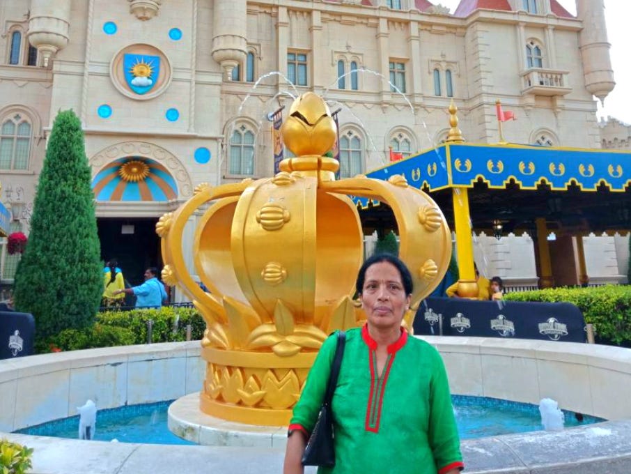 The writer's mother at Universal Studios in Singapore.