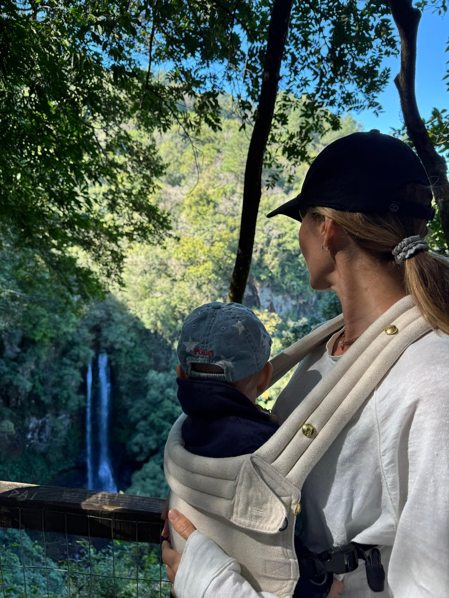 Gisele Bündchen holding her baby