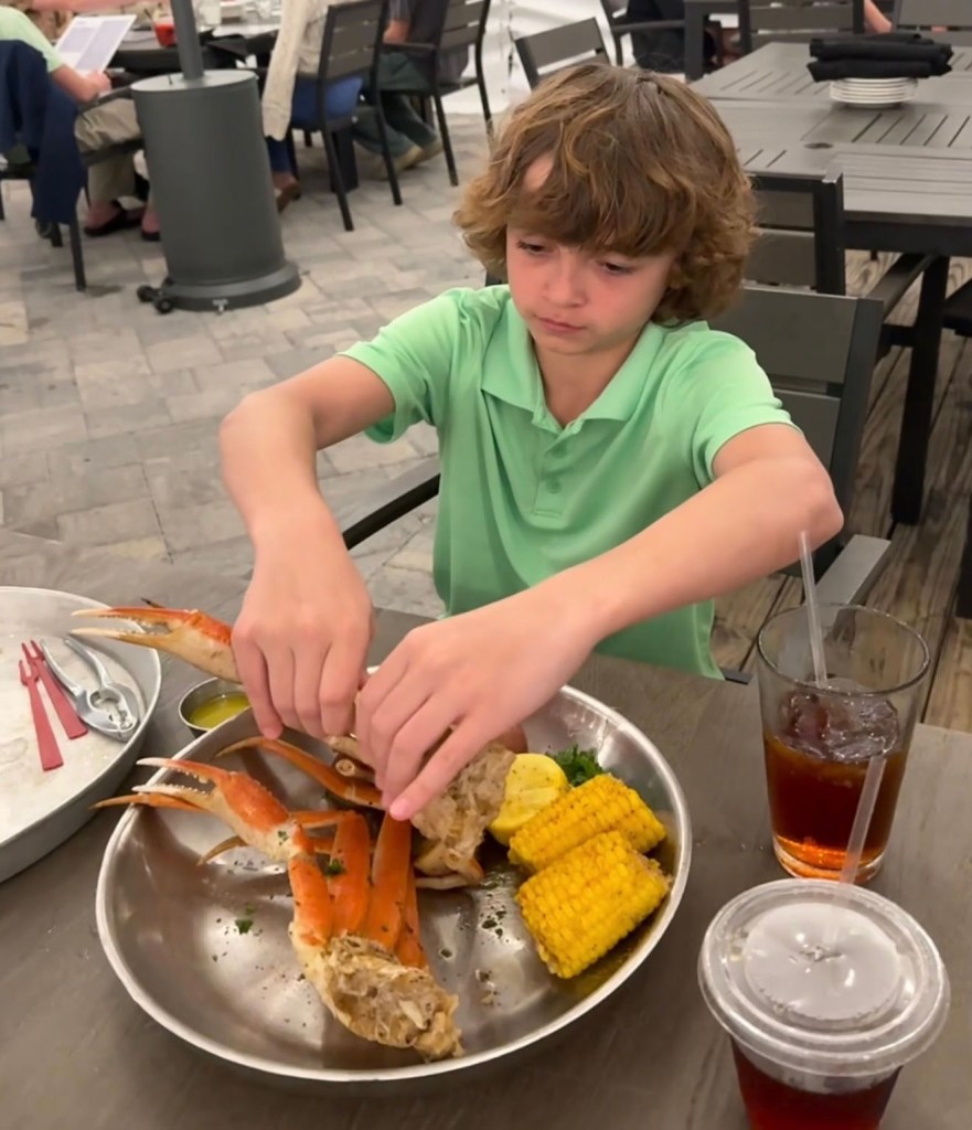 Ashley McCarley's son eating crab legs. 