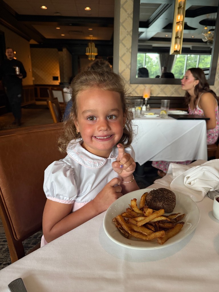 Danielle Currie's daughter at a restaurant.