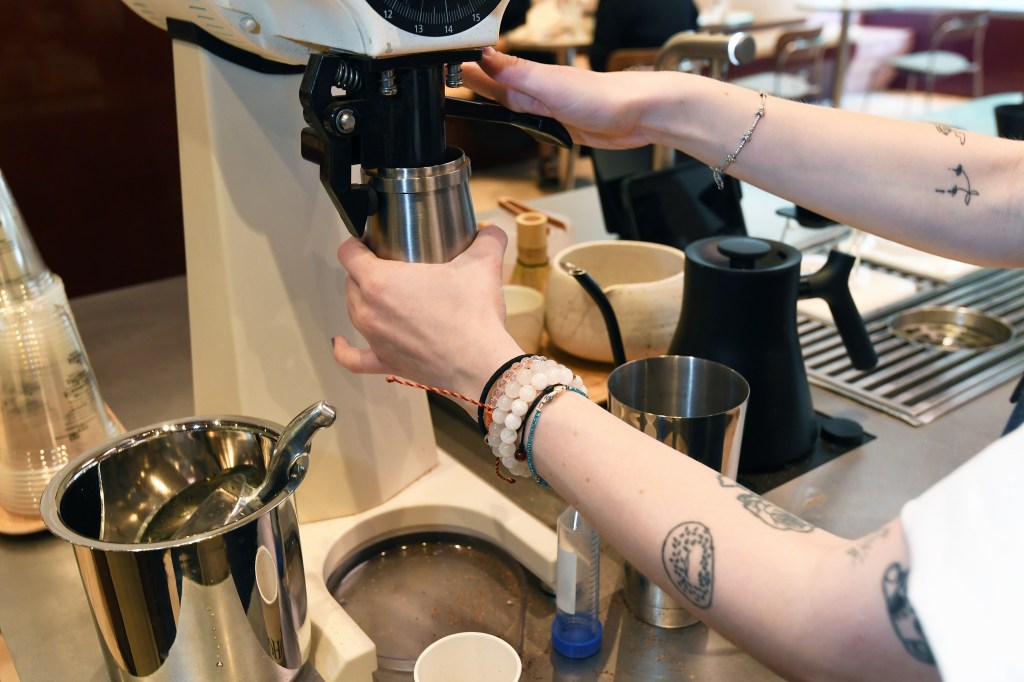 Barista Caitlin Doherty, 26, from Brooklyn, makes a specialty La Negrita coffee