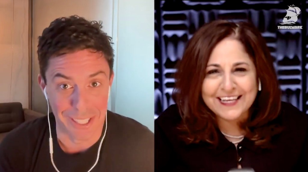 Screenshot of a video call showing a man and a woman discussing Merrick Garland.