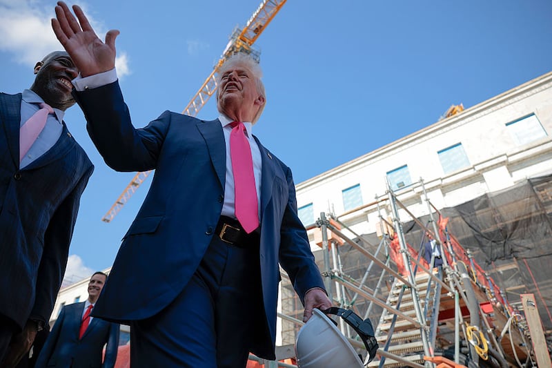 WASHINGTON, DC - JULY 24: U.S. President Donald Trump (R) delivers remarks alongside Sen. Tim Scott (R-SC) as they tour the Federal Reserve’s $2.5 billion headquarters renovation project on July 24, 2025 in Washington, DC. The Trump administration has been critical of the cost of the renovation and Federal Reserve Chairman Jerome Powell. (Photo by Chip Somodevilla/Getty Images)