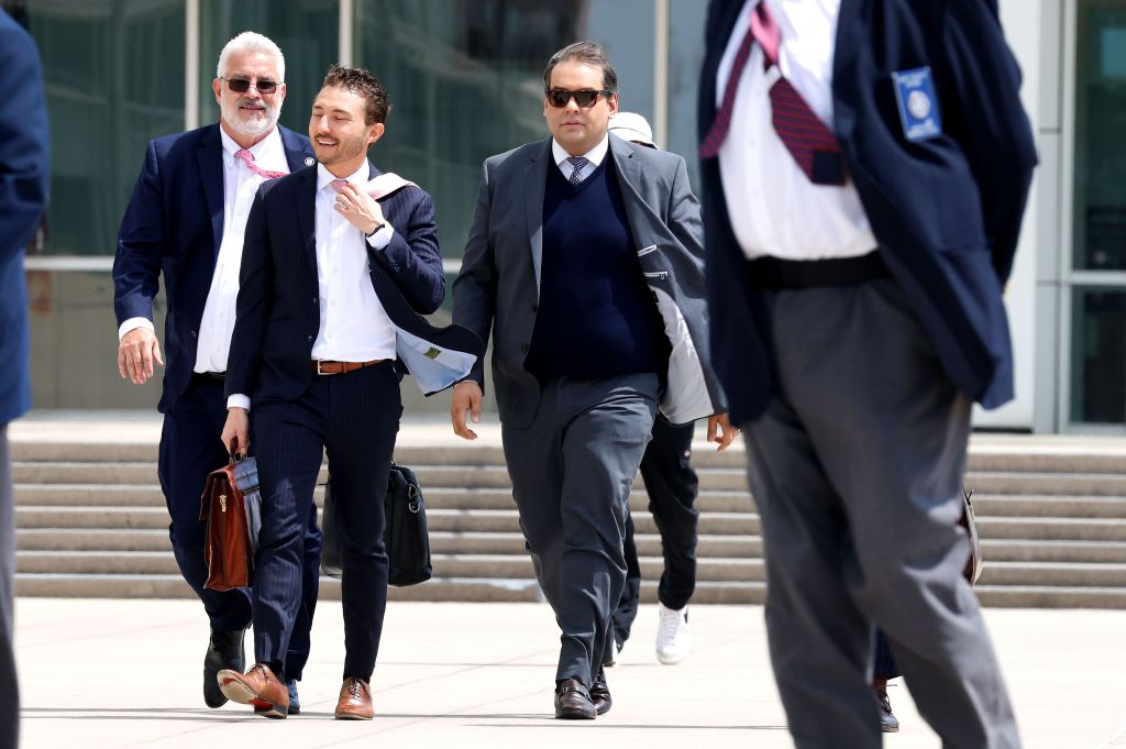 Former Rep. George Santos leaves Federal Court after his sentencing in Islip, NY on April 25, 2025.