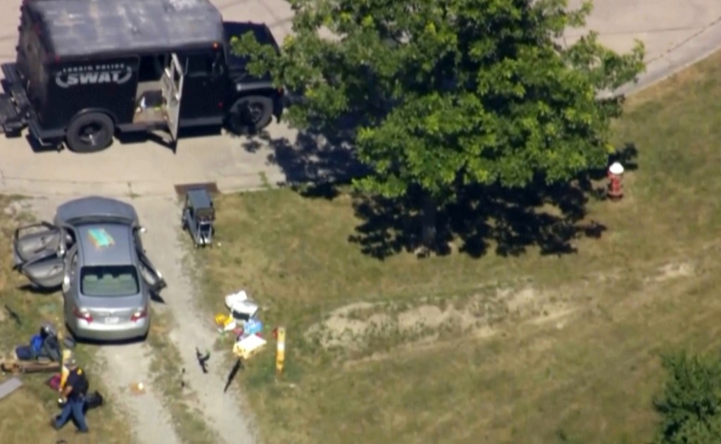 This aerial image shows police working at the deadly scene early Wednesday afternoon,  on July 23, 2025.