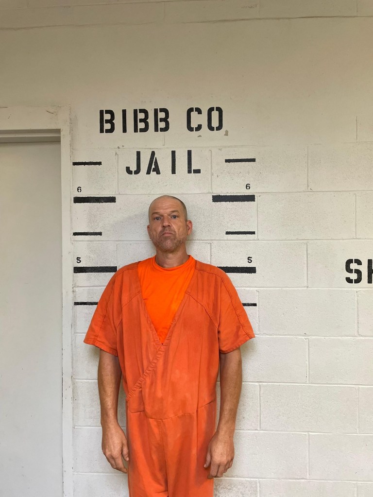Mugshot of Ricky Terrell in an orange jumpsuit.