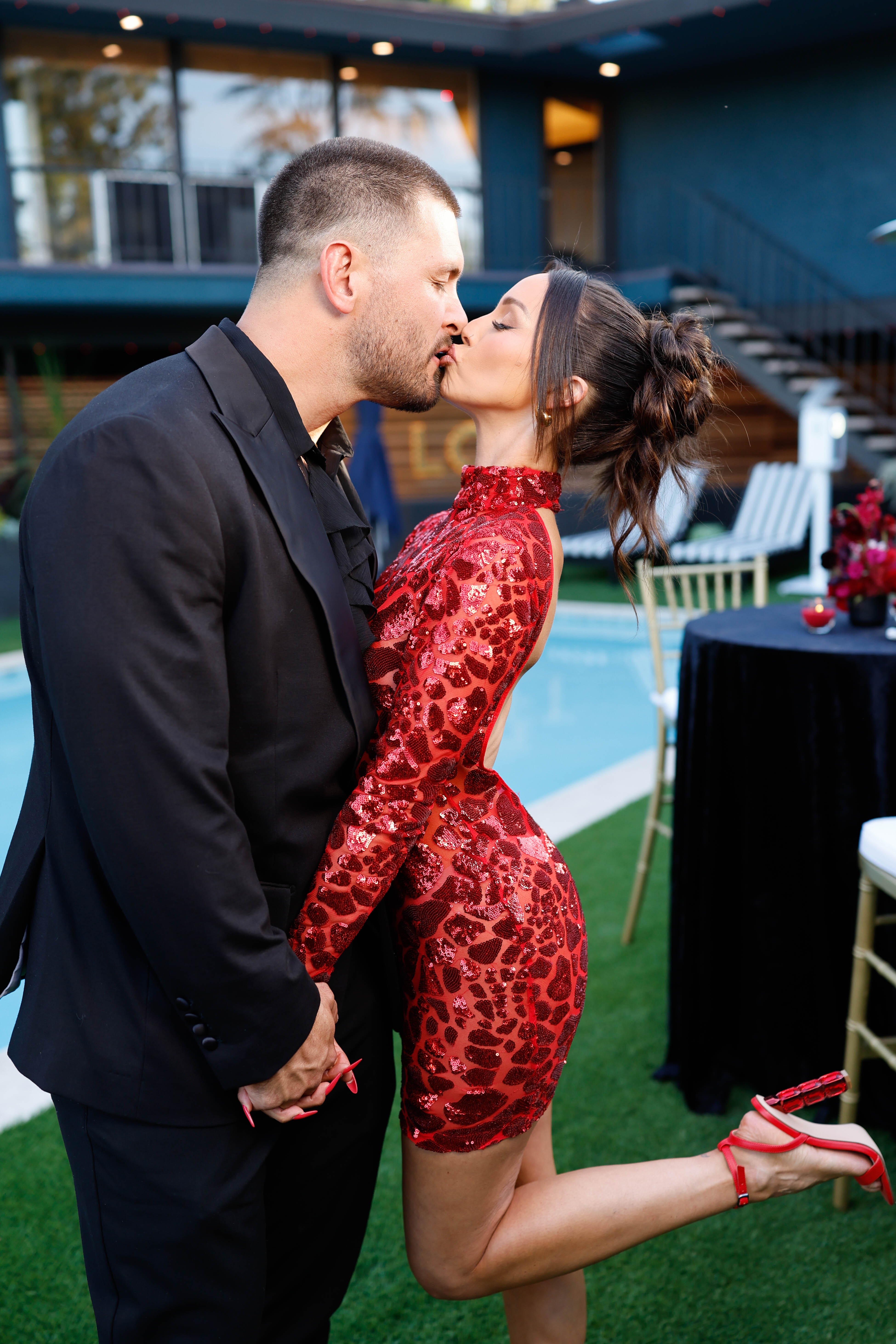 Brock Davies and Scheana Shay kissing.