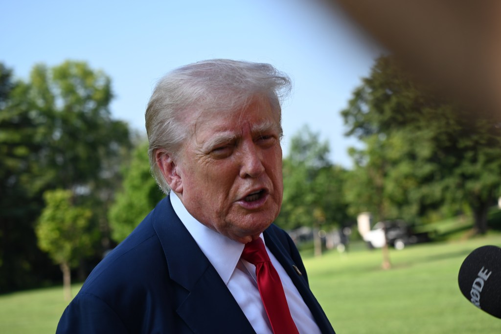 Donald Trump giving a press conference outside the White House.