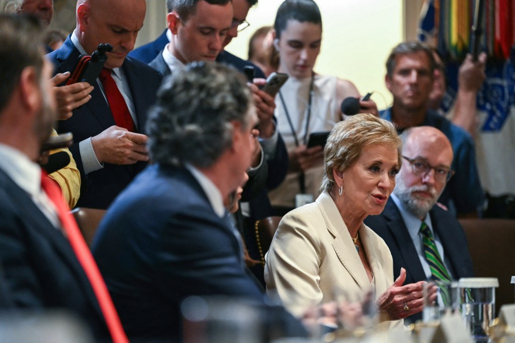 Linda McMahon speaking at a White House cabinet meeting.