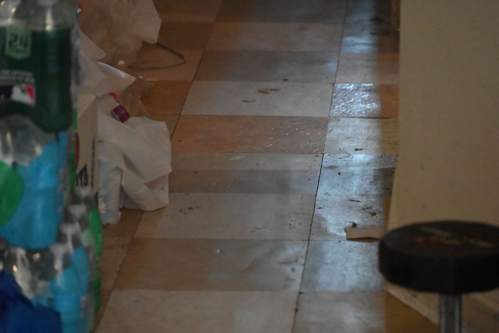 A photo obtained by The Post from inside the apartment shows layers of grime and debris inside the home where Encarnacion-Soto was tortured and killed.