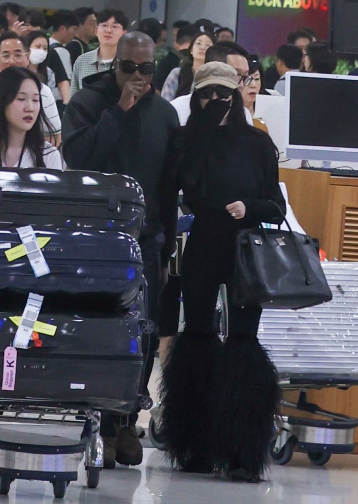 Kanye West and Bianca Censori at the Seoul airport
