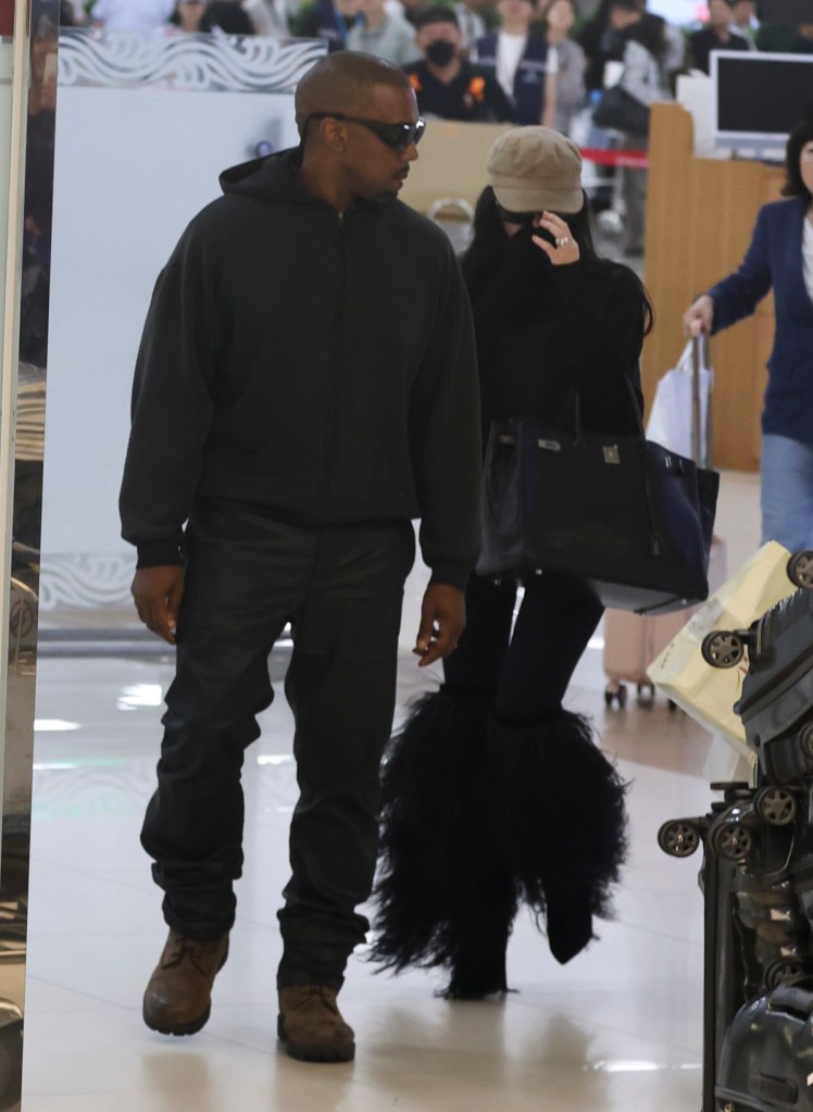 Kanye West and Bianca Censori at the Seoul airport