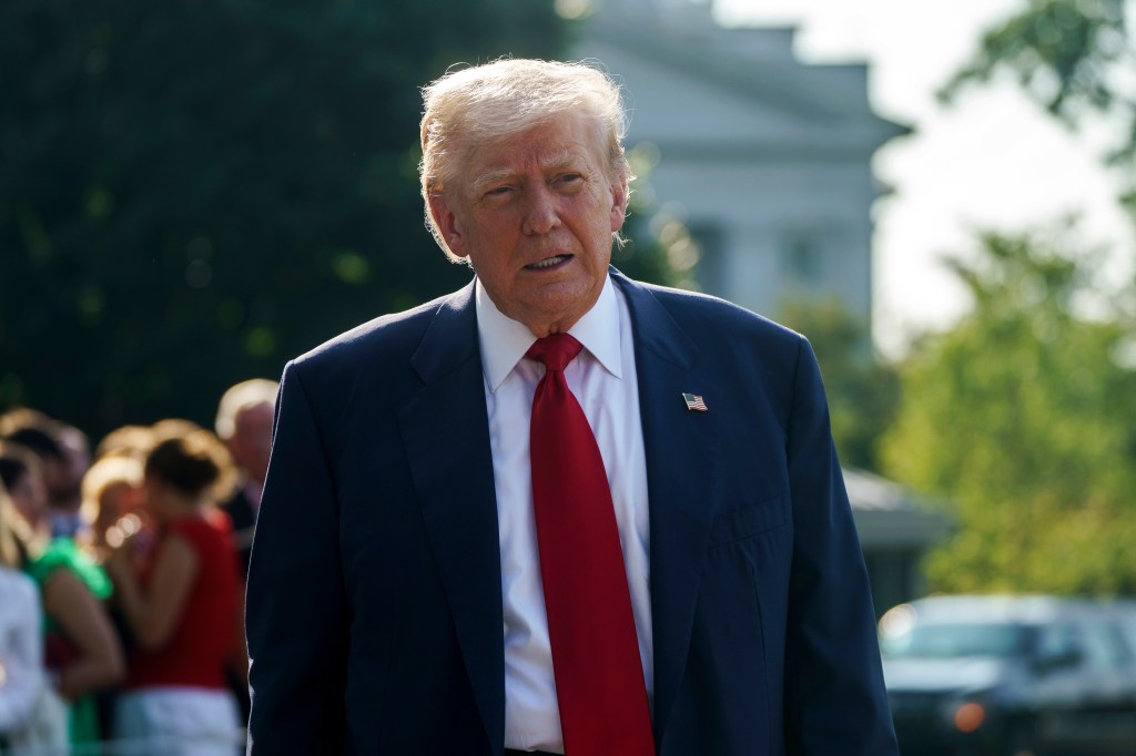 President Donald Trump speaks to reporters outside the White House on July 25, 2025.
