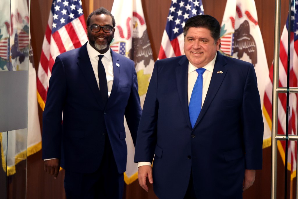 Chicago Mayor Brandon Johnson and Illinois Gov. JB Pritzker speaks after a meeting in the governor's office in Chicago on April 7, 2023.