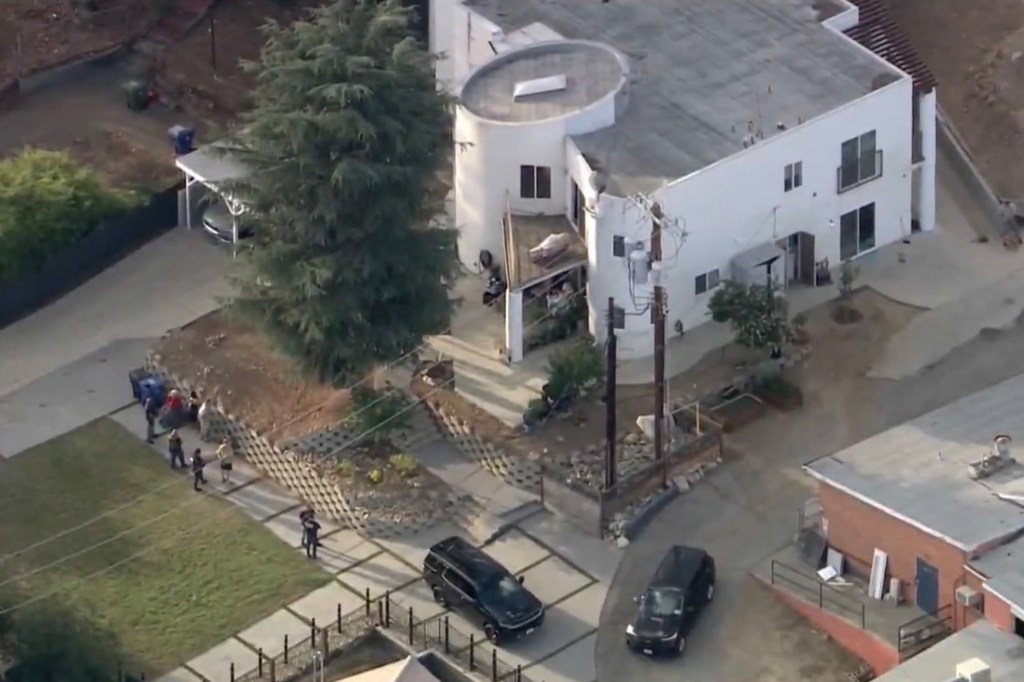 Aerial view of a house where a sex trafficking warrant was served.