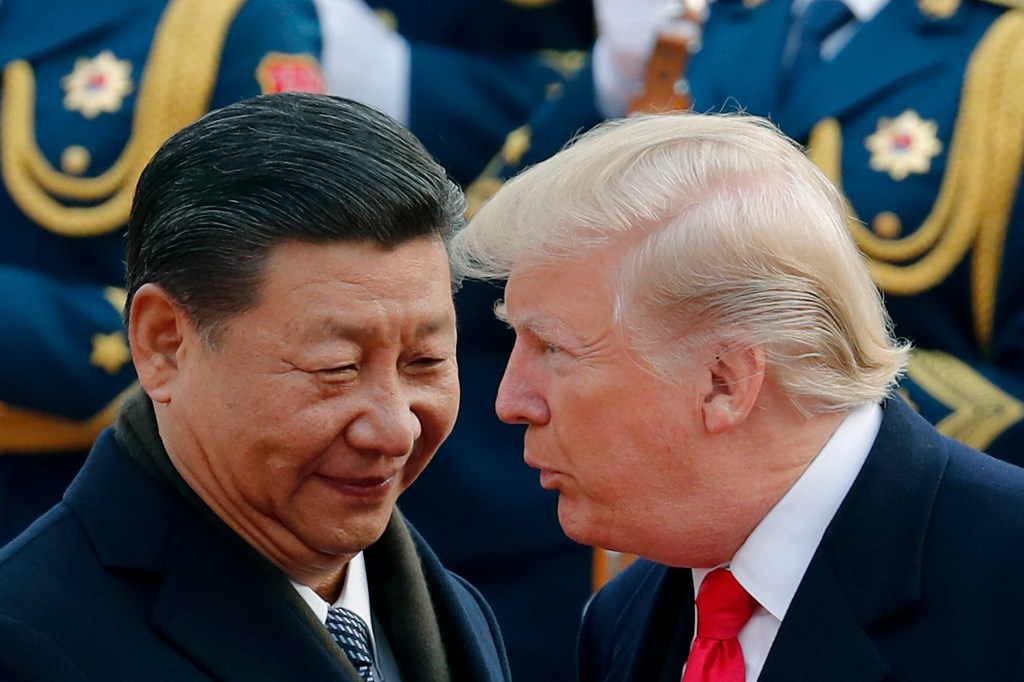 Donald Trump and Xi Jinping in conversation.