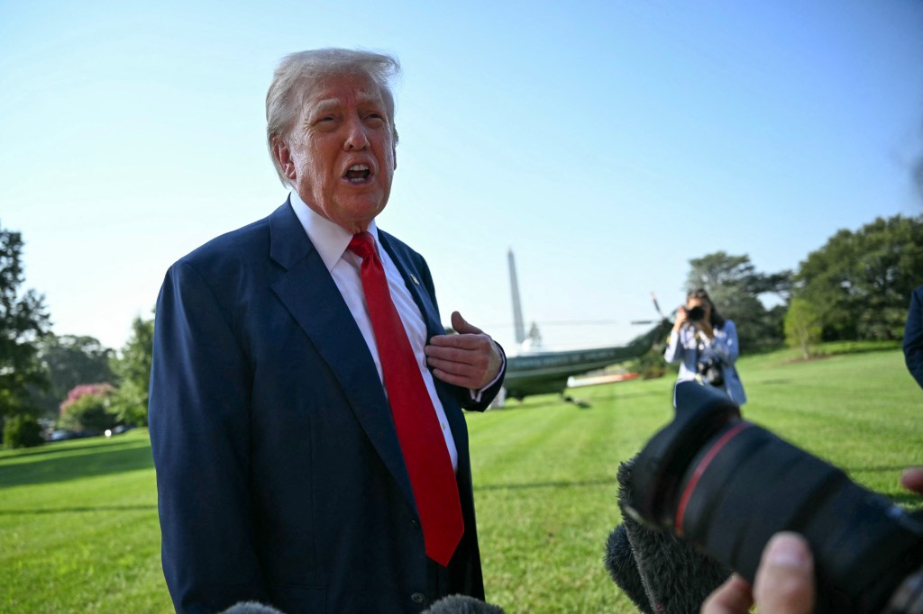 Donald Trump speaking to reporters at the White House.